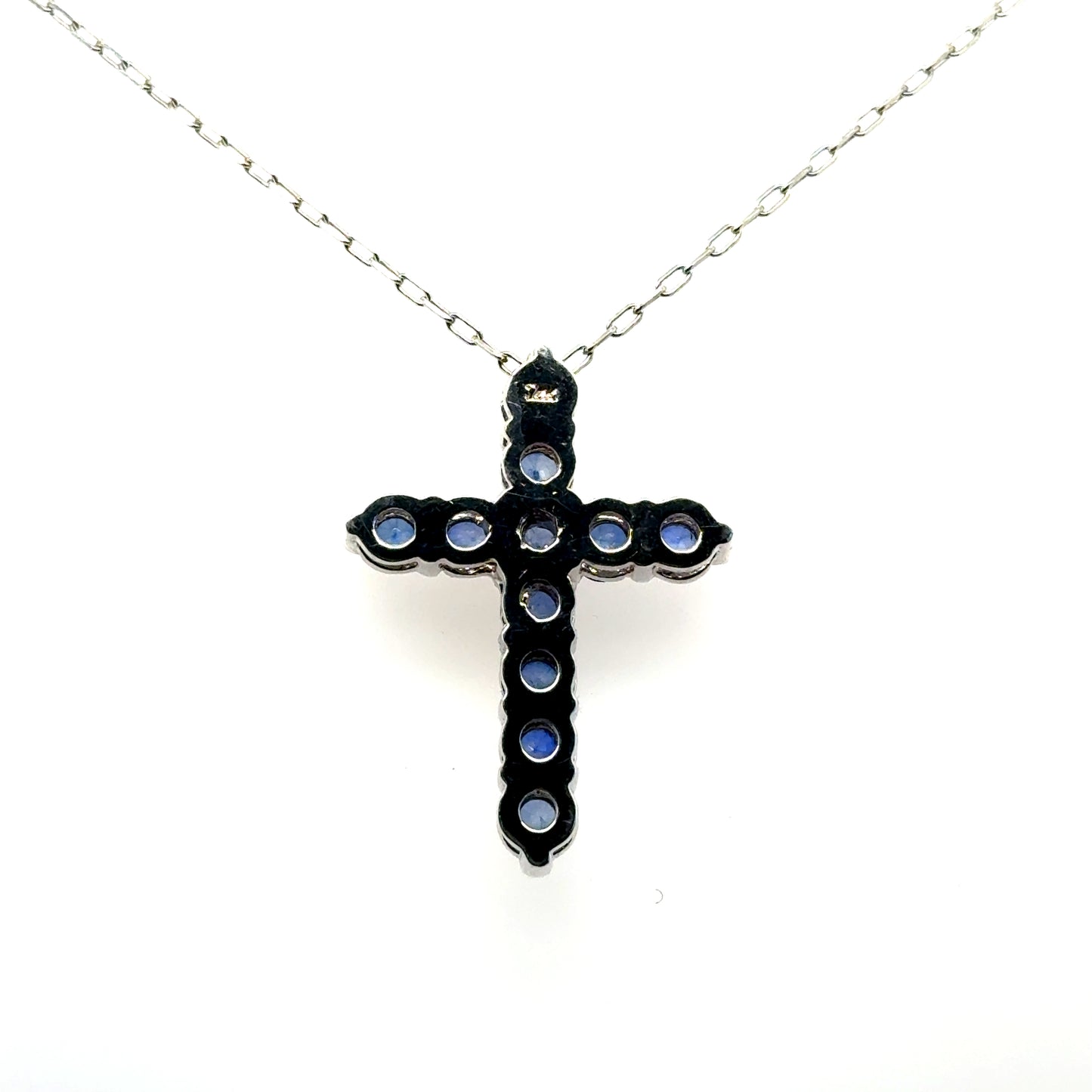 Sapphire Glow Cross Pendant