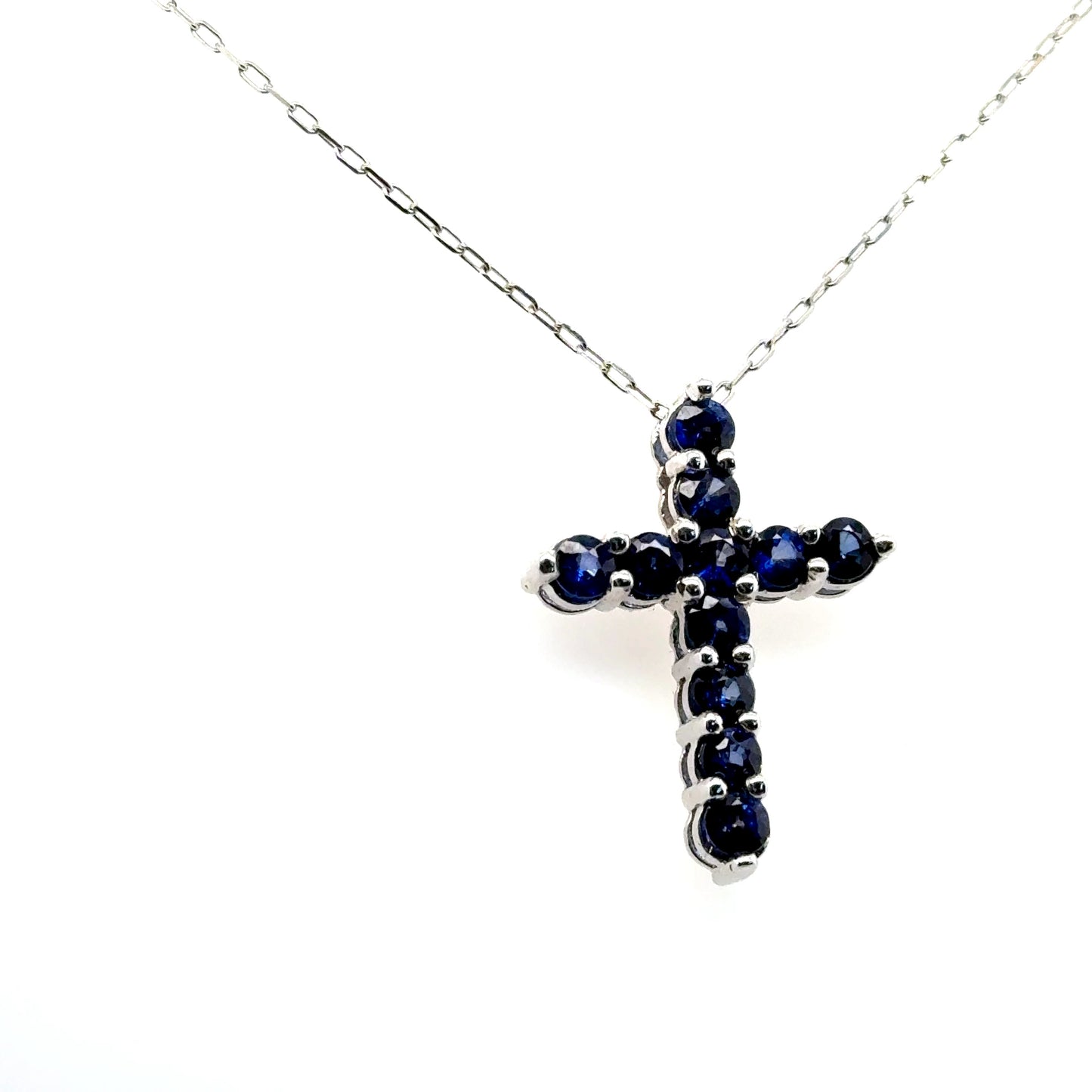 Sapphire Glow Cross Pendant